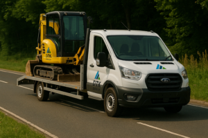 DTK Group grab lorry in operation collecting rubble from a construction site